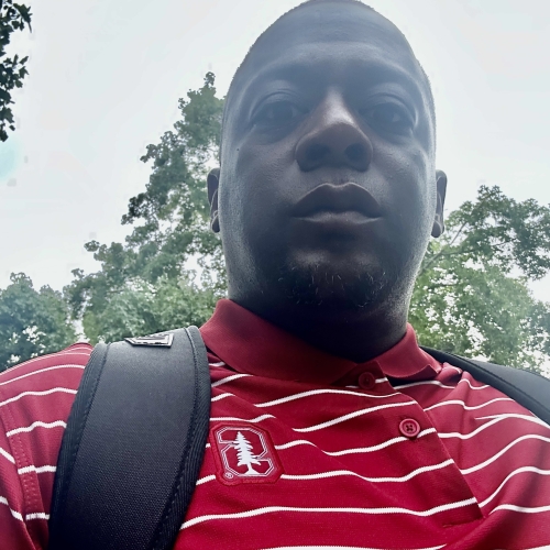 Albert Hughes in a Stanford University shirt