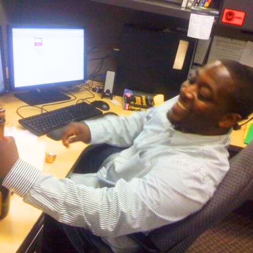 Albert Hughes at his desk at Schipul