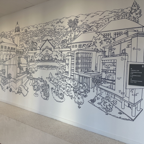 Mural in entry way of Cardinal Hall on the Stanford Redwood City campus 