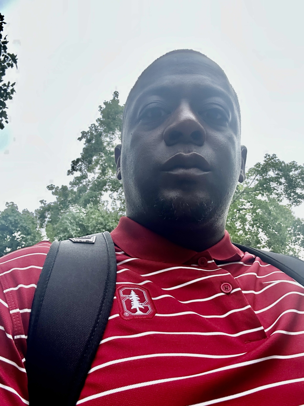 Albert Hughes in a Stanford University shirt