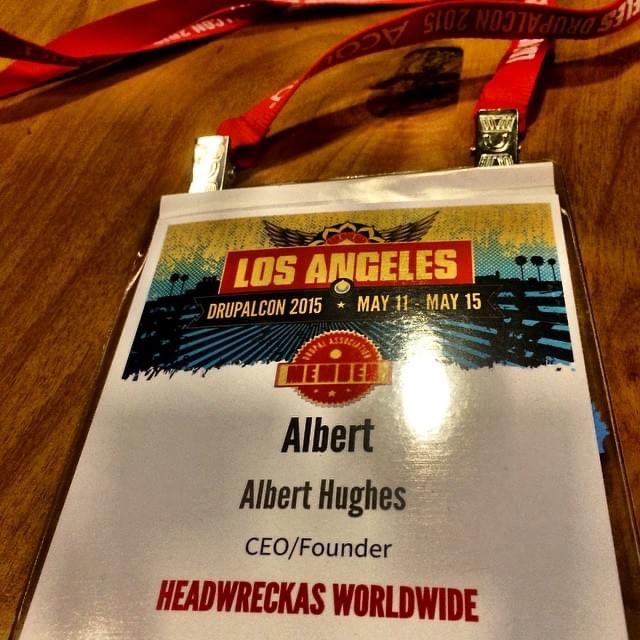 DrupalCon 2015 badge that says Albert Hughes